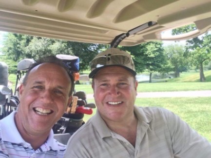 Chuck and a team golfer